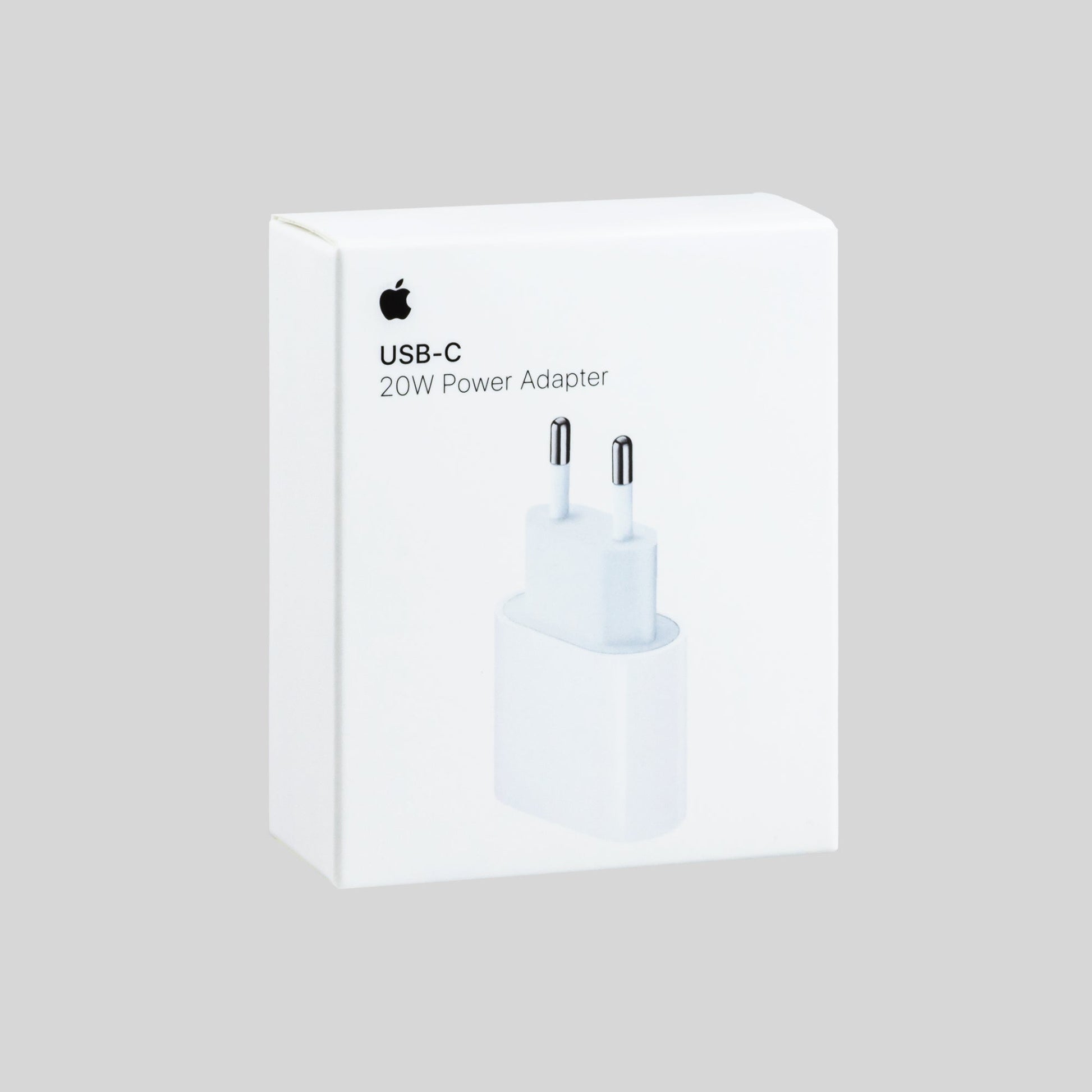 Apple USB-C Ladegerät Verpackung Frontal Hintergrund Grau