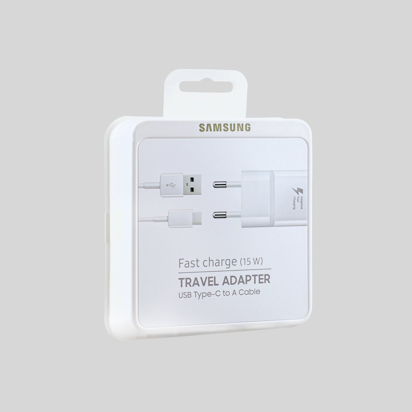 Samsung USB-A Ladegerät mit Verpackung Hintergrund Grau