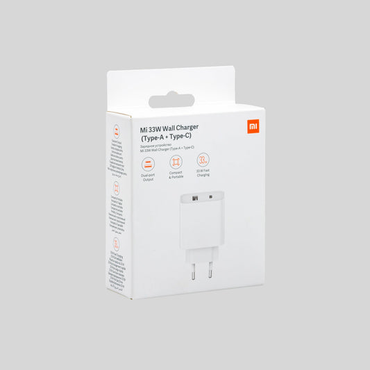 Xiaomi 33 Watt Wandladegerät mit Verpackung von vorne Hintergrund Grau